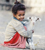 Girl with her new goat.